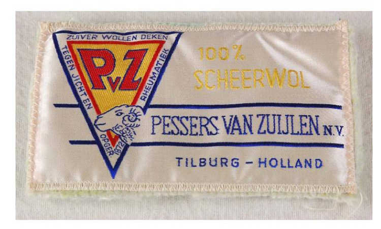 Wollendeken etiket van Pessers van Zuijlen uit de periode 1940-1960